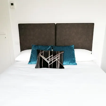 Apartahotel Joivy Boutique Farneti Milán