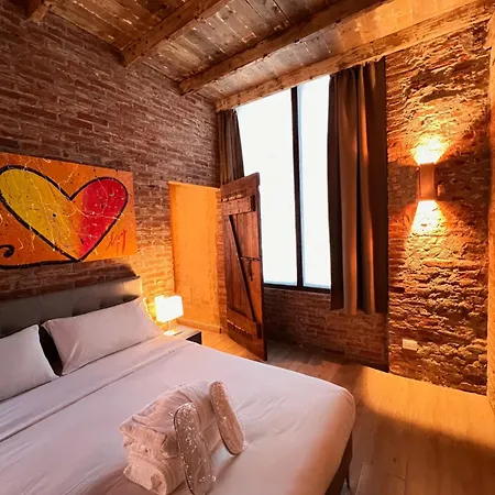 Emme Loft I Orange Moon - Vibrant Modern Luxury Loft