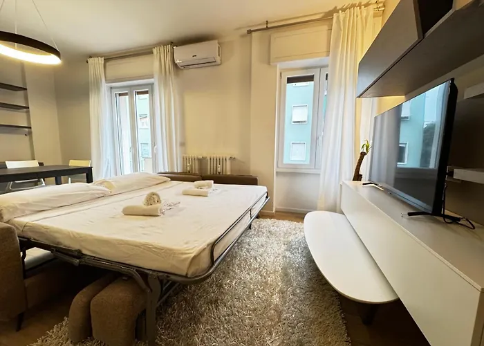 Kibilu - Via Inganni Milán