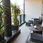Hilton Garden North Hotell 4*