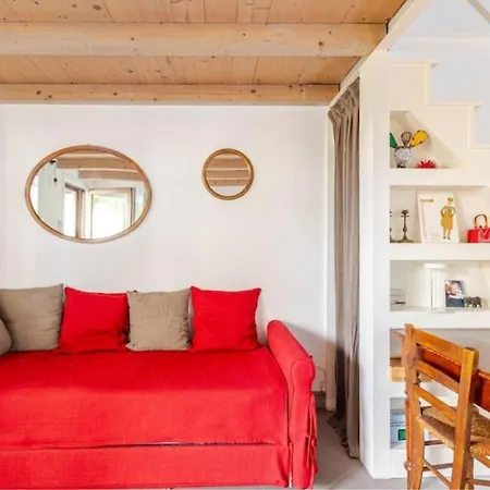 Tiny House On Water Surrounded By Greenery *