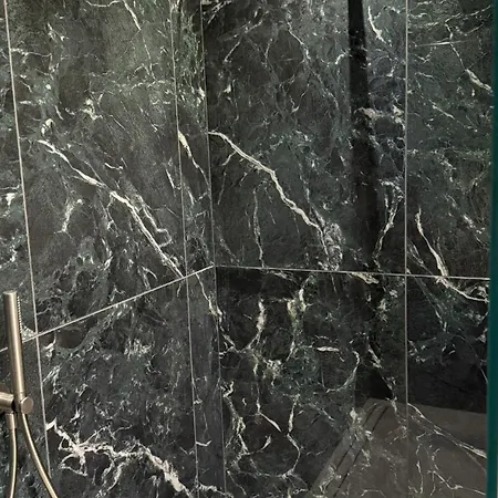 Ando's Boutique Garden Apartman