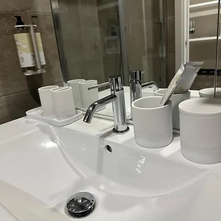 Milhouse - Vitruvio Station Милан