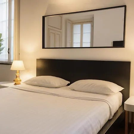 Dhomes - And * Milan