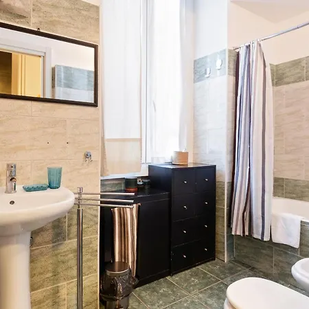 Appartement Cosy Nest Isola District Heart
