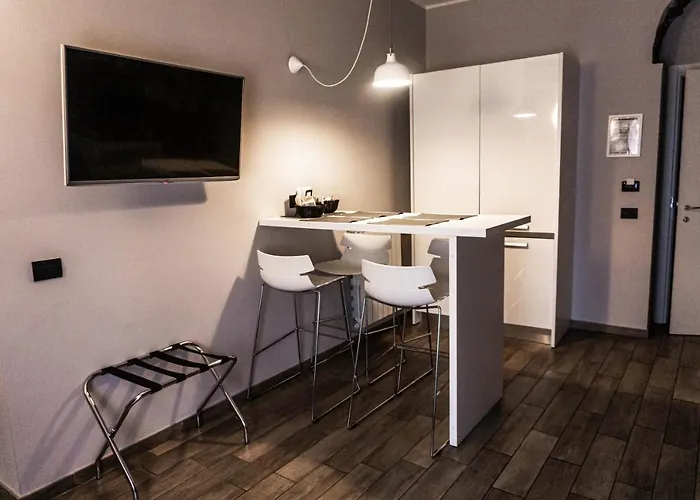 Meneghino Lägenhetshotell