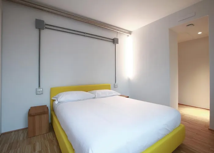 Basicvillage * Milán