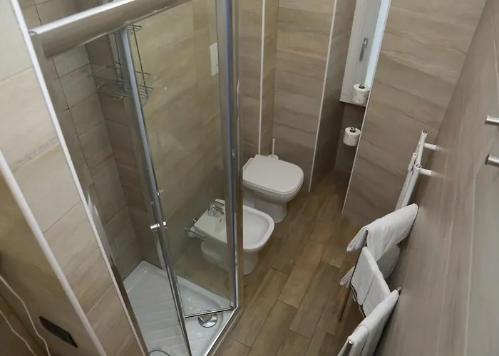 Meneghino Lägenhetshotell