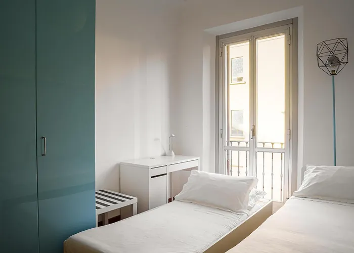 Accomodo - Miq41 Quadrivano * Milán