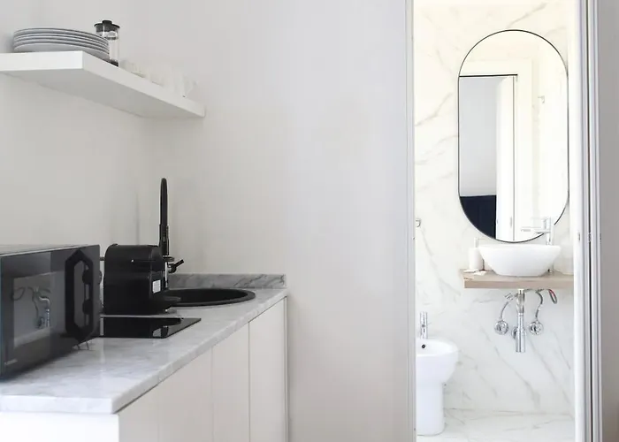 Couette-café Isaia 4*