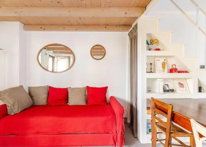 Tiny House On Water Surrounded By Greenery *