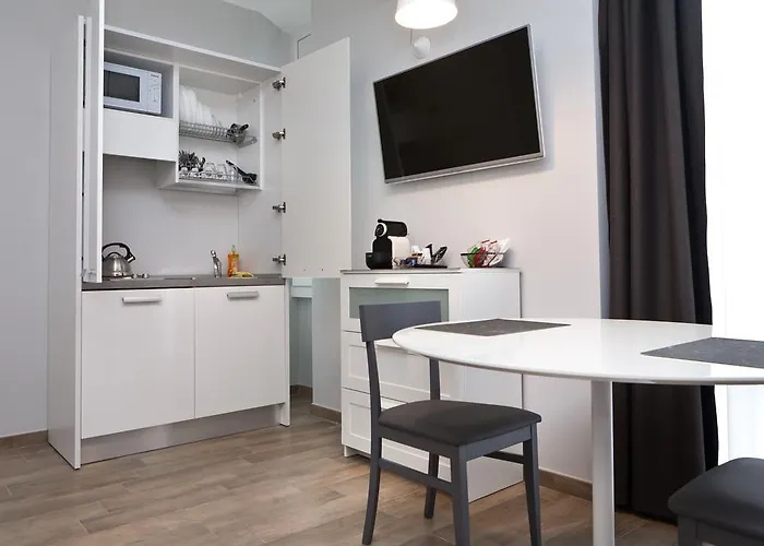 Lägenhetshotell Meneghino 4*