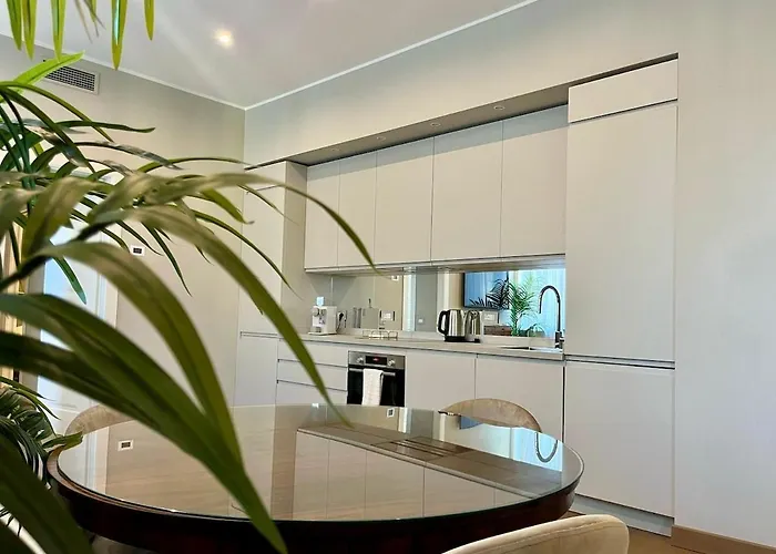 Апартаменты Il Glicine - Luxury Urban Oasis *