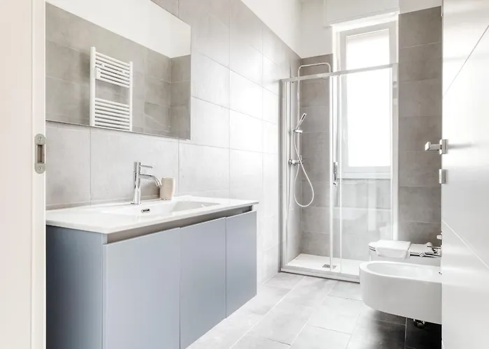 Joivy Stylish 2-bedroom Flat Near Citylife District Апартаменты *