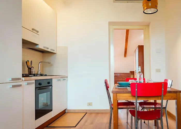 Apartman Luminosa Mansarda Con Travi In Legno