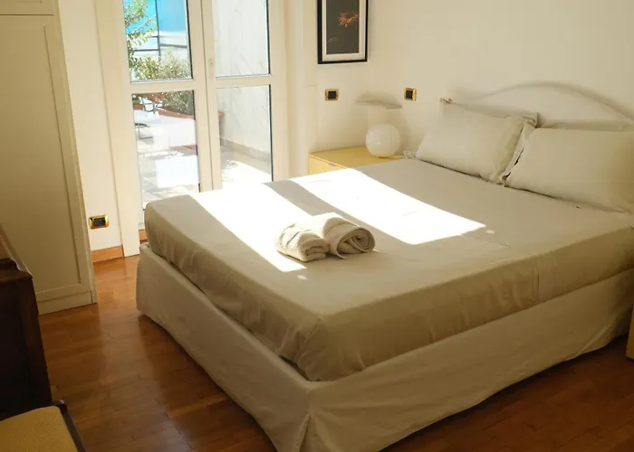 Апартаменты Rooftop Suello 9 - Terrazza Privata A