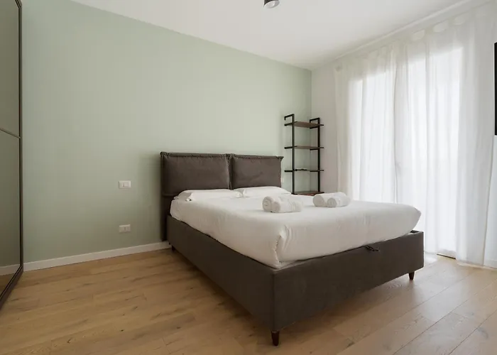 Guesthost - Cascina Merlata Lovely Nest Apartment