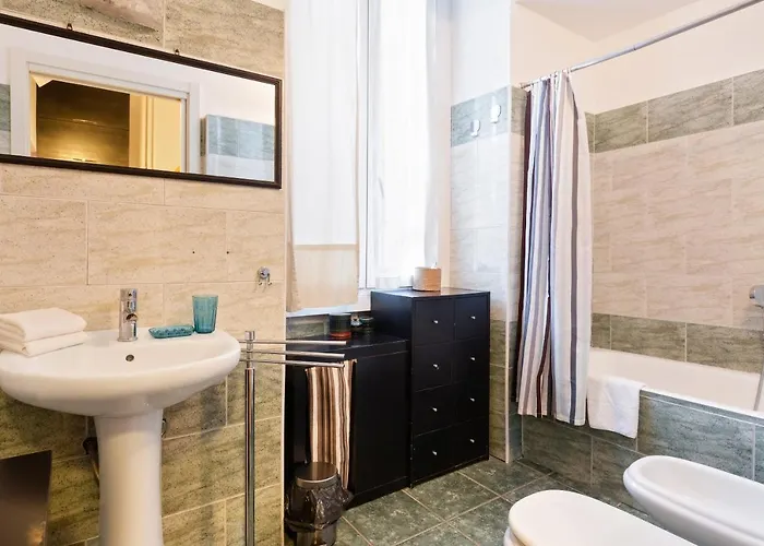 Apartmán Guesthost - Cosy Nest Isola District Heart