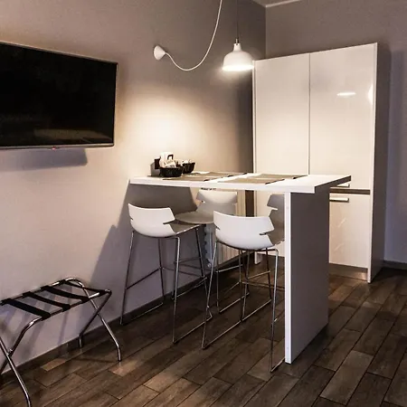 Meneghino Apartahotel