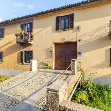 Tiny House On Water Surrounded By Greenery