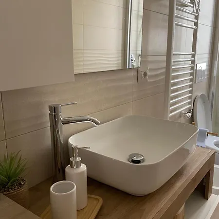 Golden House Arbe Daire Milano