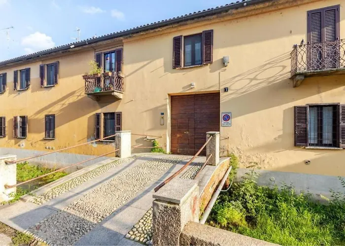 Tiny House On Water Surrounded By Greenery