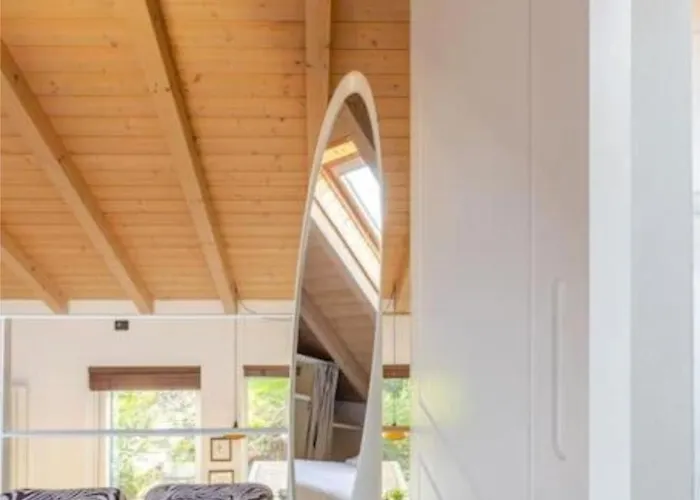 Tiny House On Water Surrounded By Greenery Milano