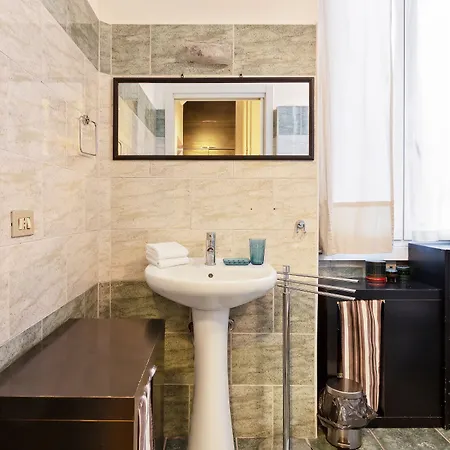 아파트 Guesthost - Cosy Nest Isola District Heart